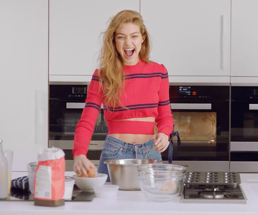 Slender girl prepares herself a healthy breakfast